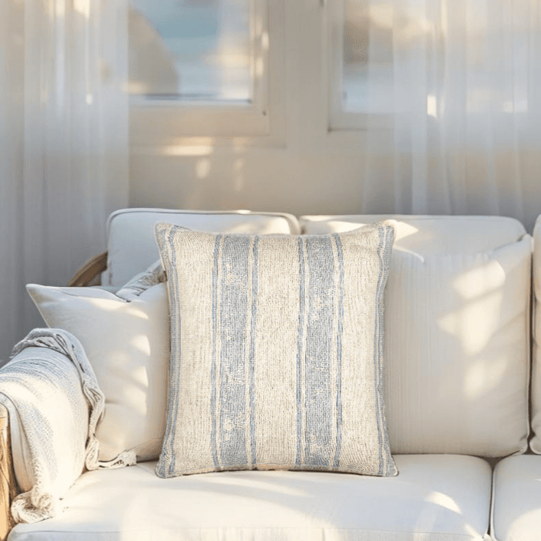 Beach-style couch pillow with woven texture