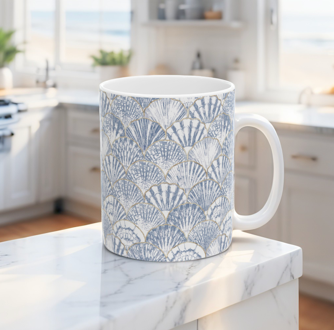 White ceramic coffee mug with seashell design, perfect for coastal kitchens