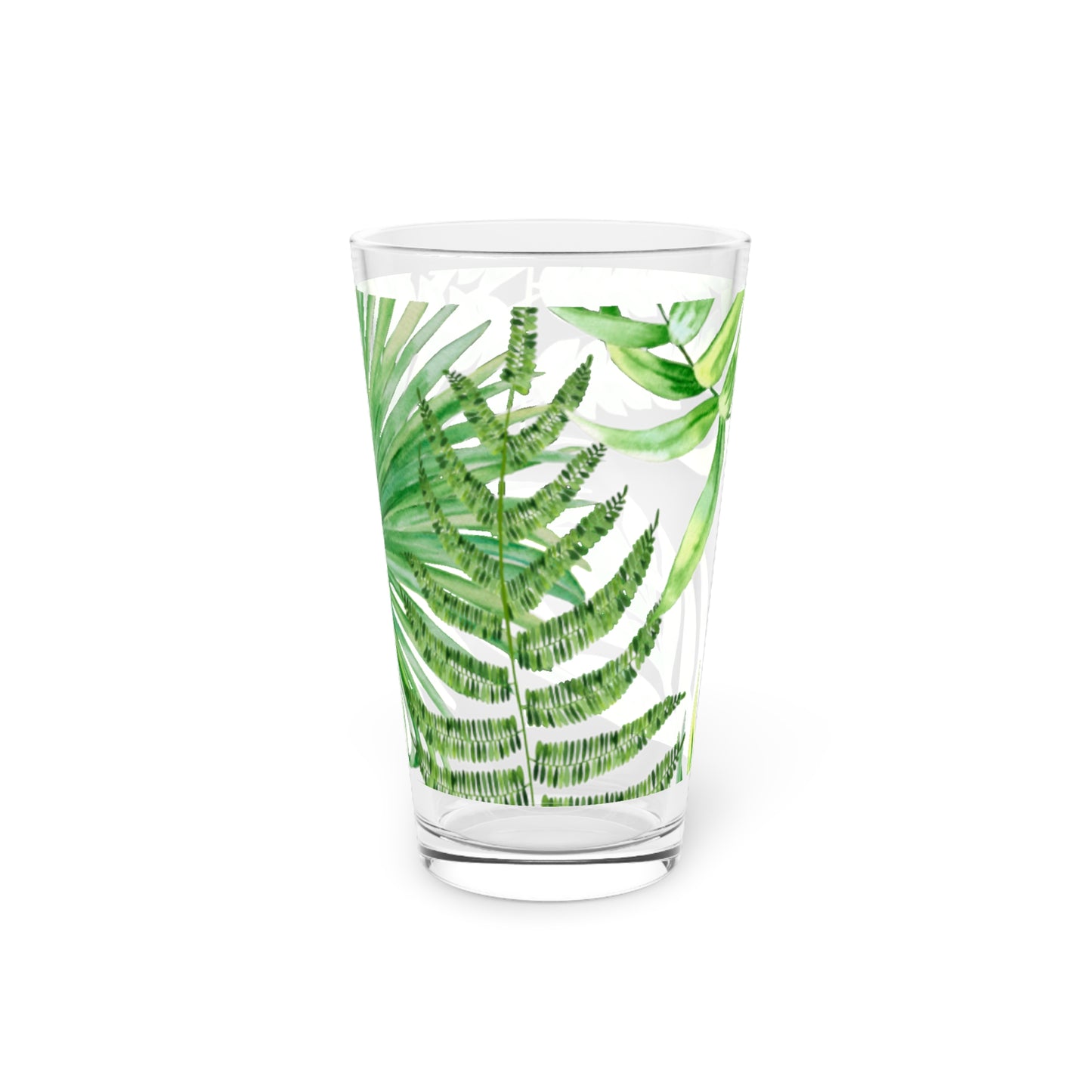 Boho tropical print drinking glass with colorful leaf pattern.