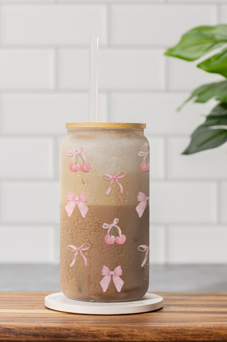 Charming cherry-print sipper glass with a retro-inspired design, perfect for summer drinks