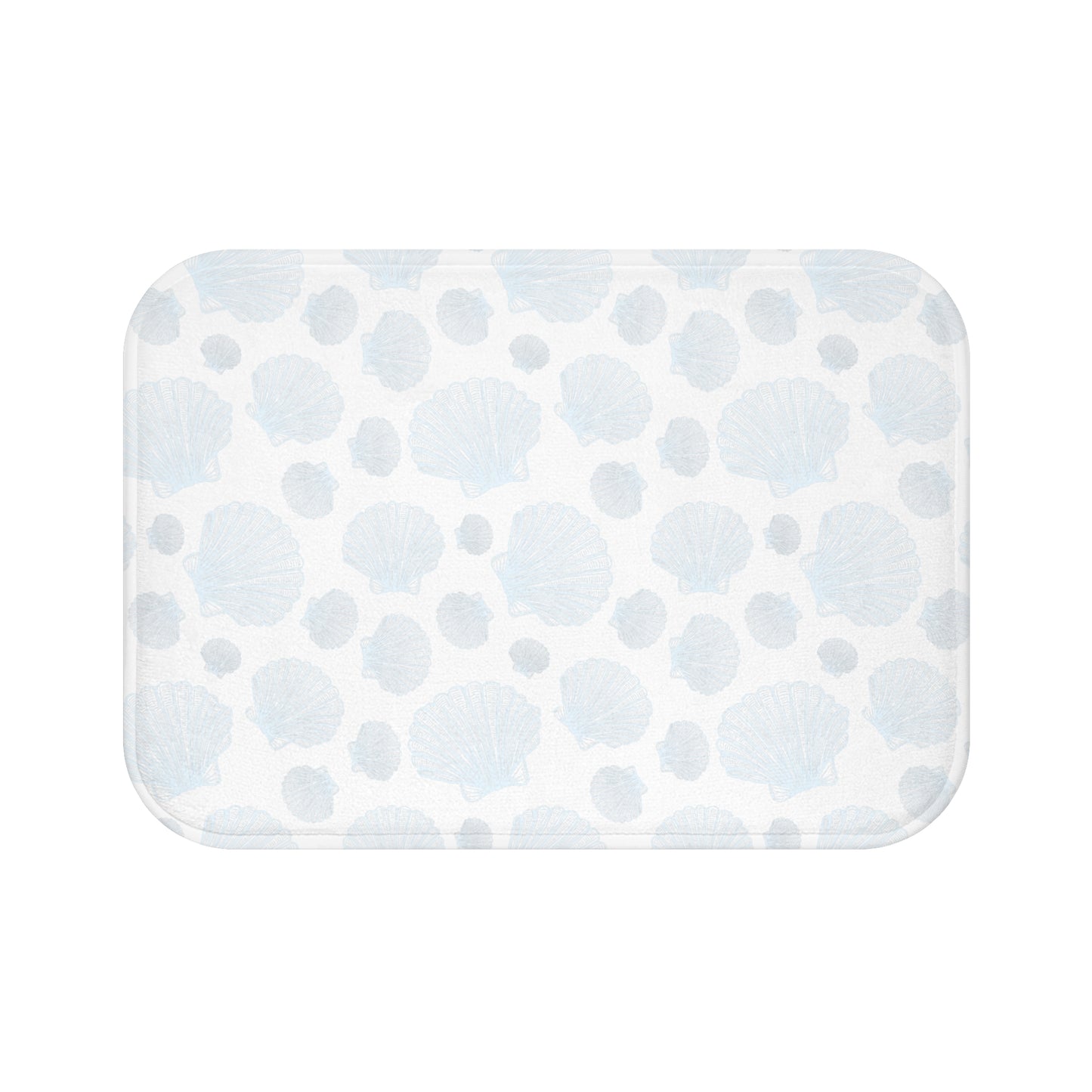 Nautical-themed bath mat featuring seashell and rope accents, perfect for a maritime bathroom style