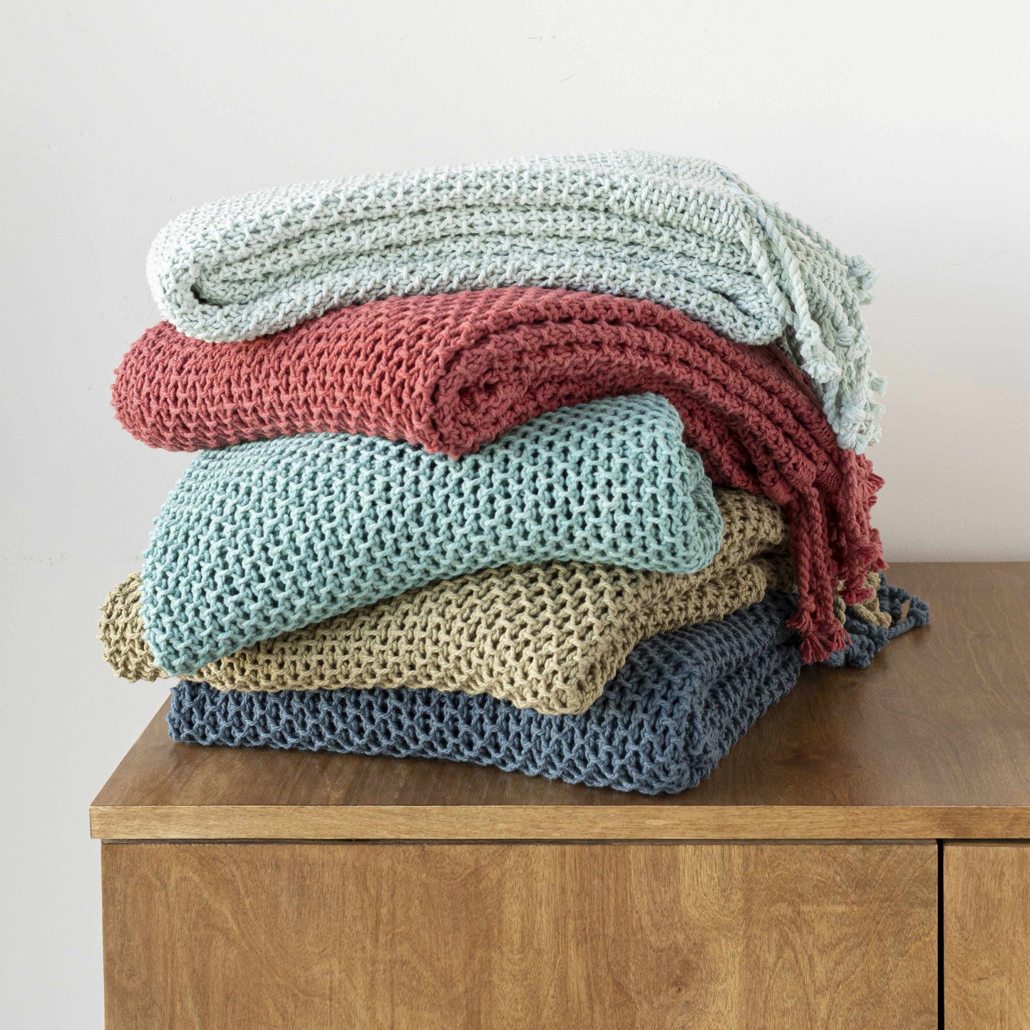 Ocean-inspired navy throw blanket in nautical home