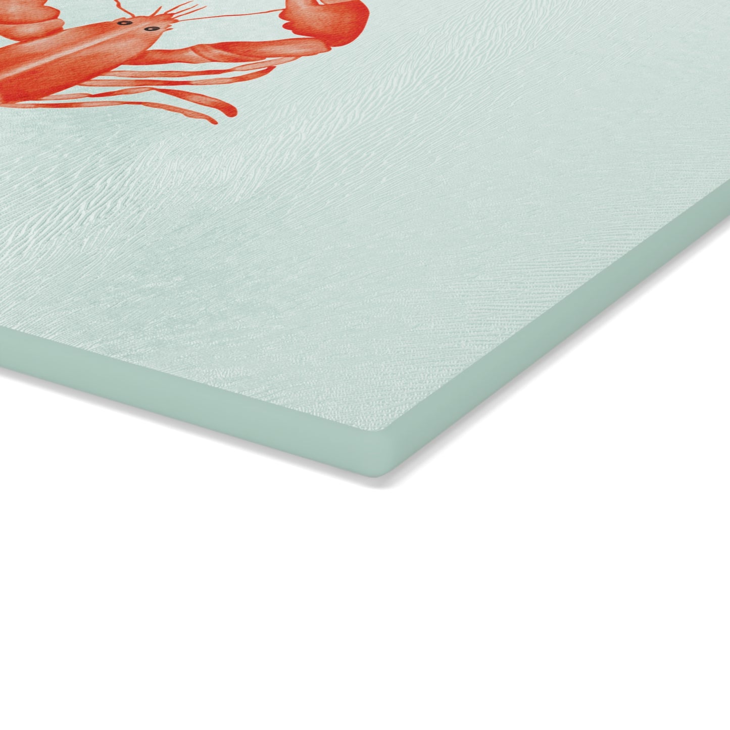 Seafood-themed cutting board featuring lobster illustration on glass