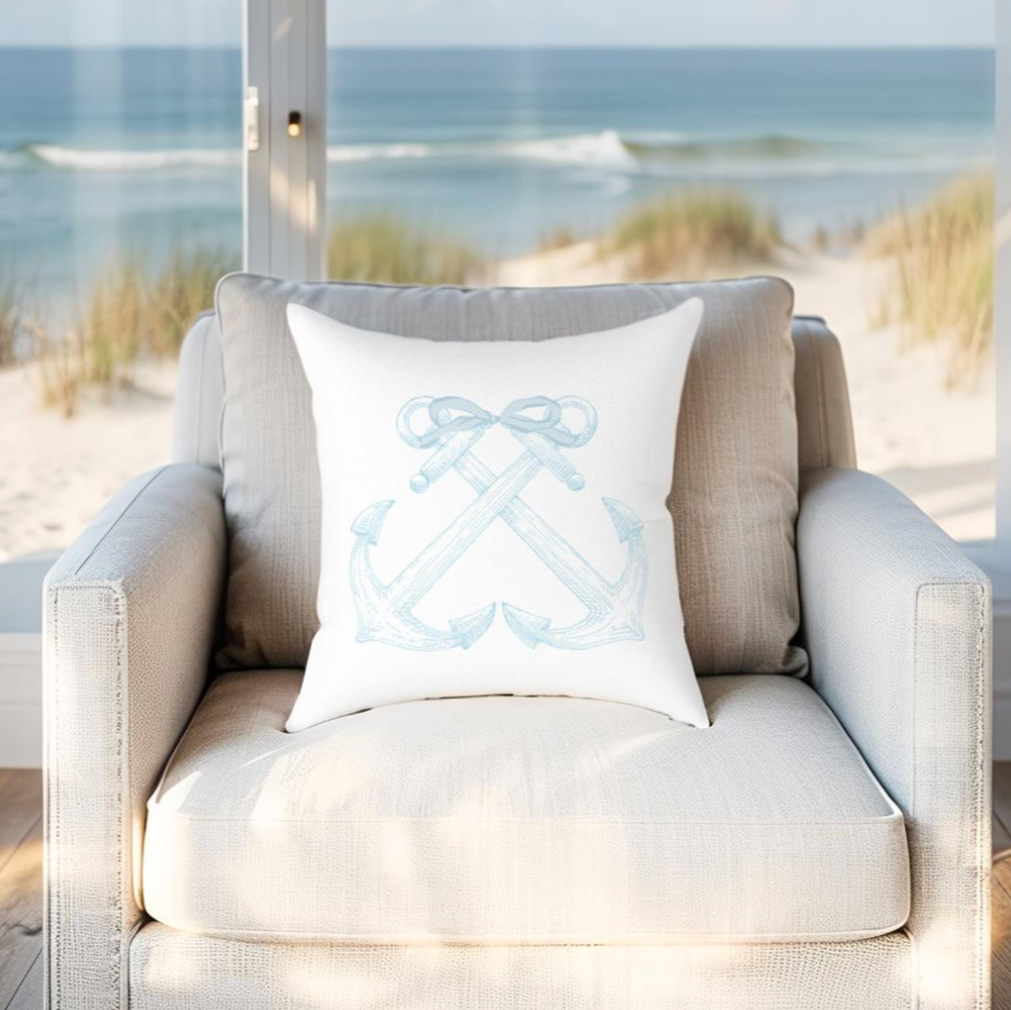 Decorative anchor pillow in light blue, perfect for cottage, coastal, or maritime home decor.