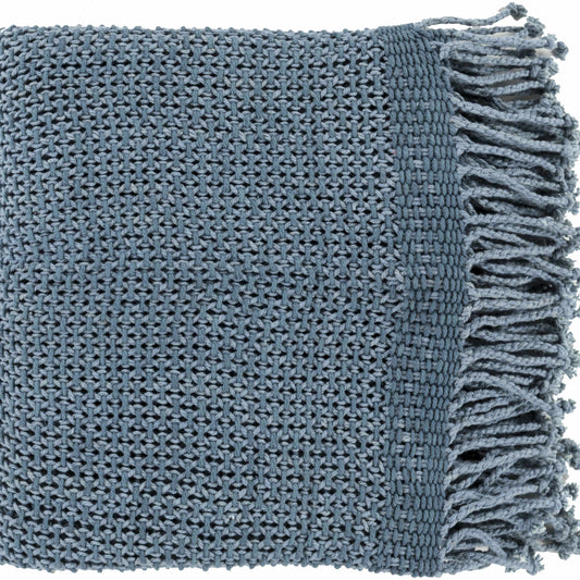 Beach house decor with navy blue throw blanket