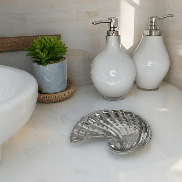 Ceramic soap dish shaped like a seashell for beach house bathroom
