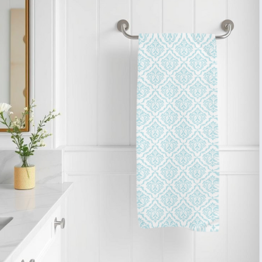 Elegant coastal damask bath towel in blue and white, perfect for beach-themed bathrooms
