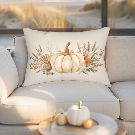 Neutral pumpkin and seashell pillow for coastal home décor