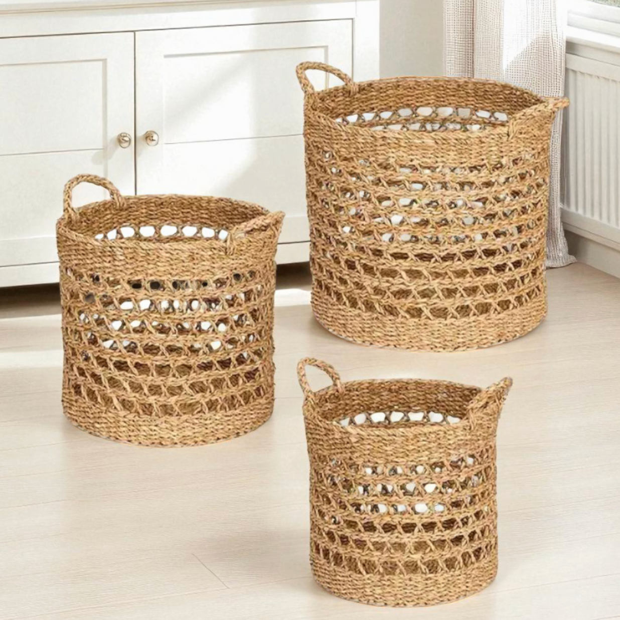 Set of three woven rattan baskets for coastal home organization