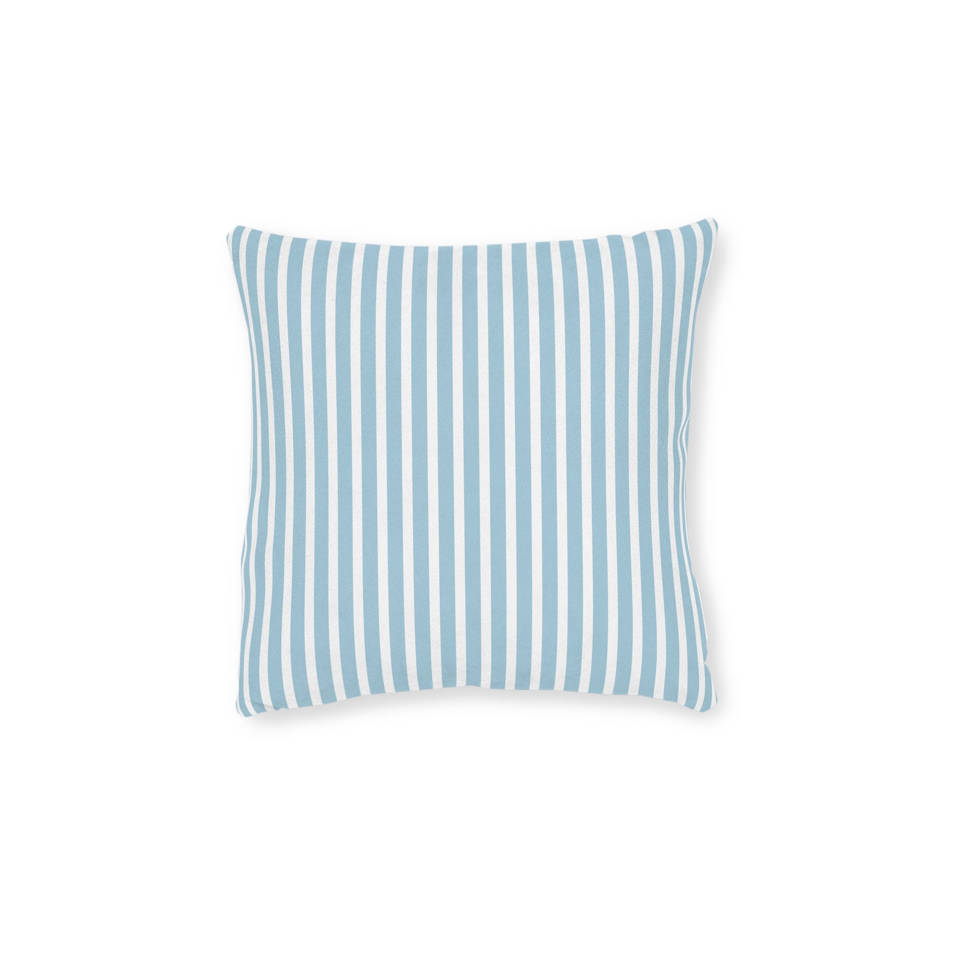 Blue coastal pillow with woven fabric used in a coastal living room setup