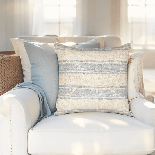 Coastal striped throw pillow cover in blue and beige tones