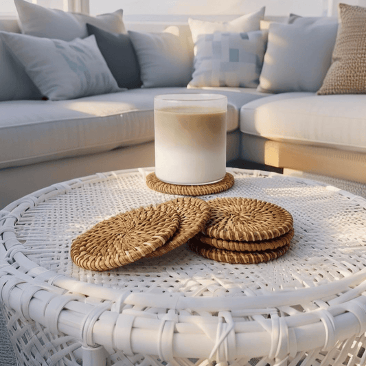 Eco-friendly boho rattan coasters in a beach house table setting