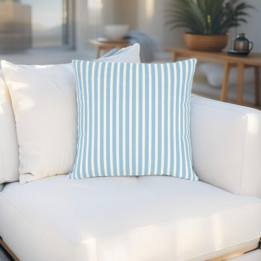 Nautical blue and white accent pillow for beach house living rooms