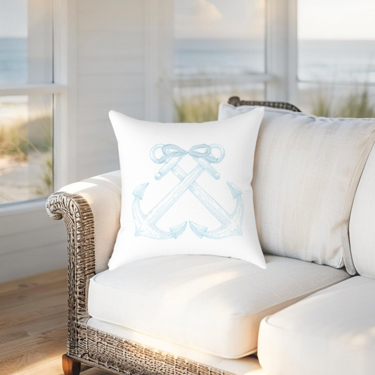 Light blue throw pillow with anchor motif, ideal for beach-themed, nautical or coastal-style interiors.