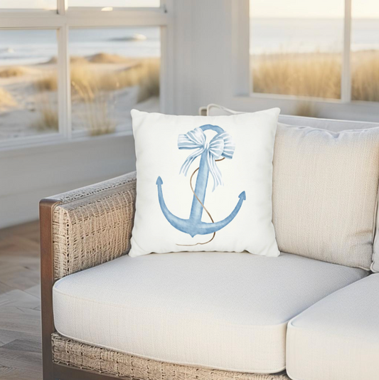 Navy blue anchor throw pillow perfect for nautical and coastal home decor.
