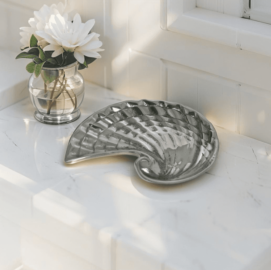 Seashell-shaped ceramic soap dish for coastal bathroom decor