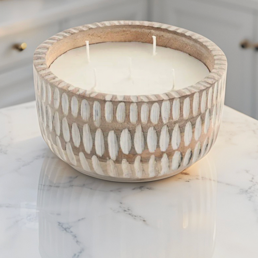 Coastal candle with pineapple breeze scent on marble counter