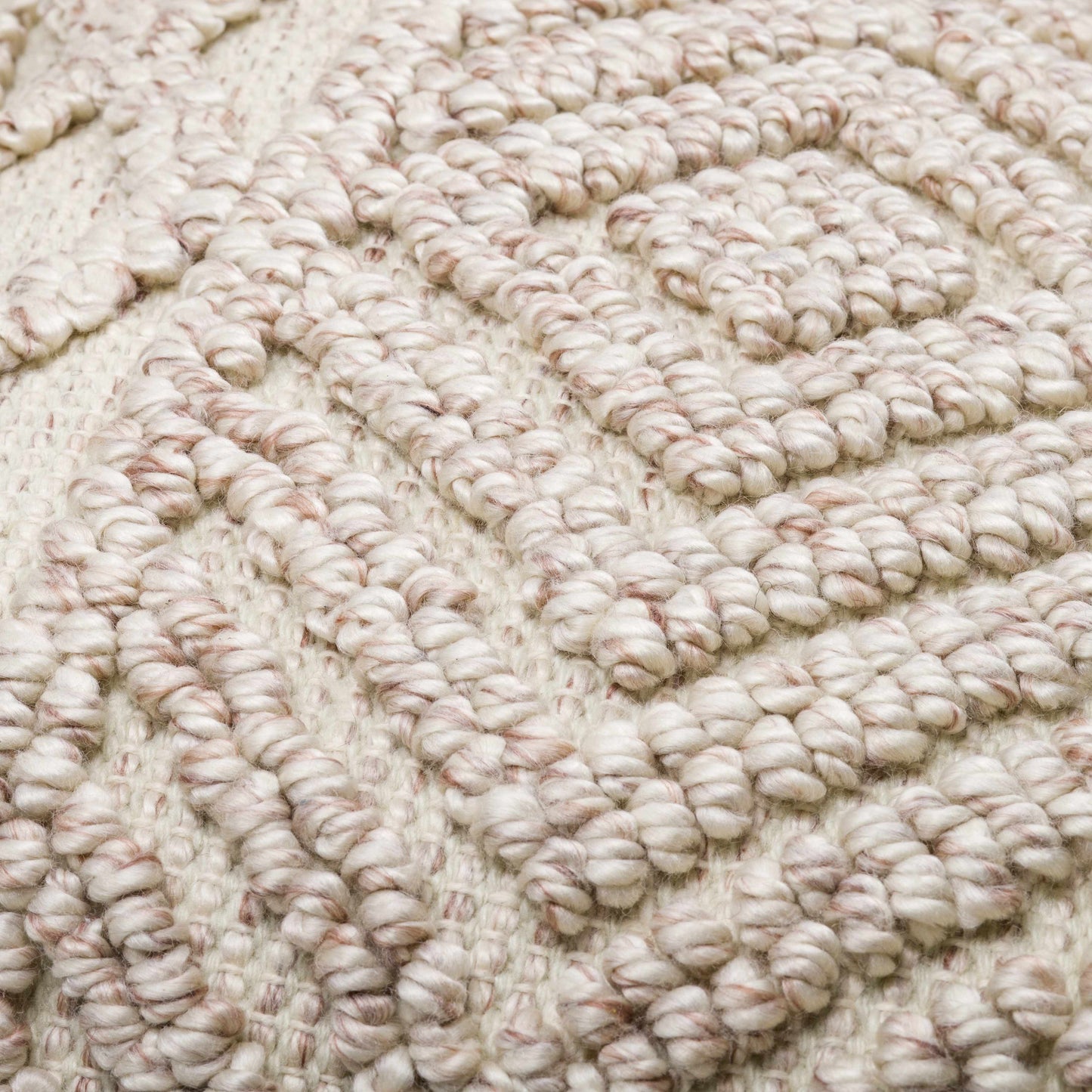 White textured throw pillow with boho modern design