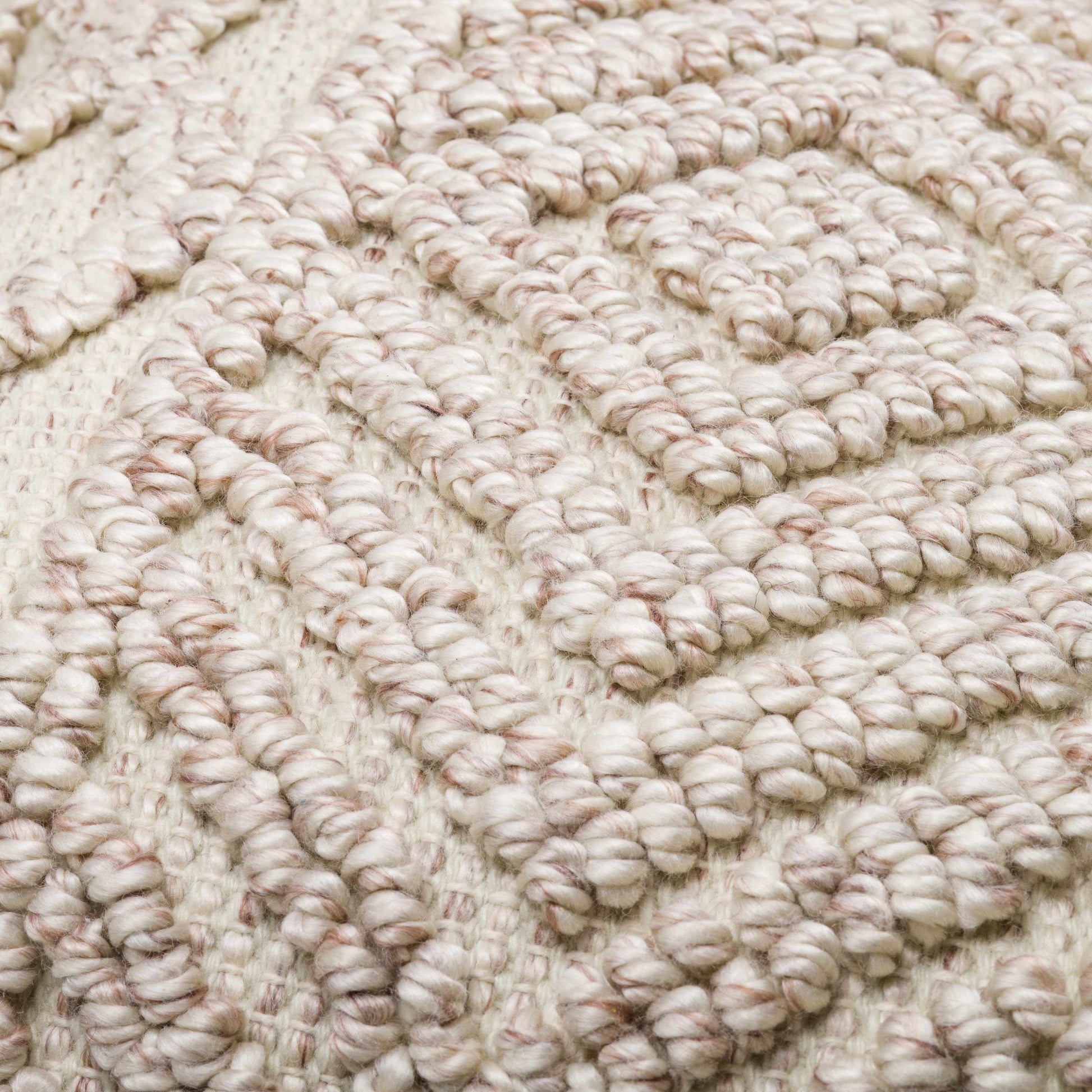 White textured throw pillow with boho modern design